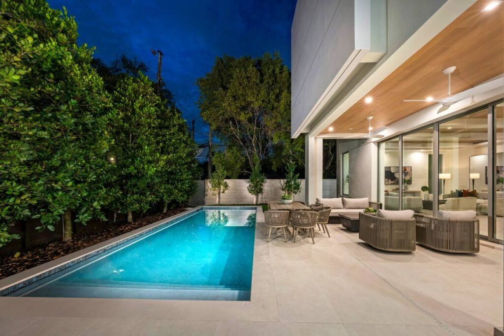 Why Your Patio Umbrella Sucks (And How a Cantilever Umbrella with Sunbrella Fabric Fixes It)